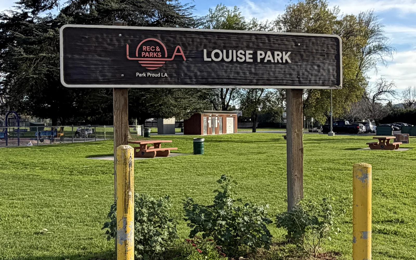 Louise Park in Los Angeles, featuring green space and community recreation facilities that represent quality-of-life amenities valued by families